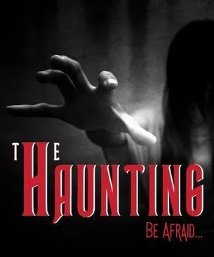The Haunting poster: a pale hand reaching out of the dark — Be afraid…
